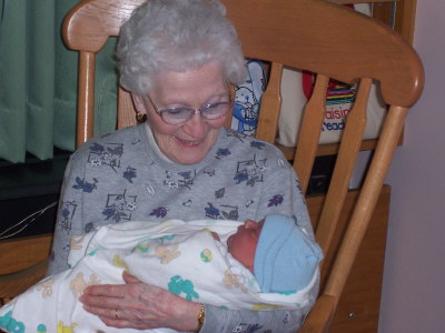 Great Grandma Guay holds Nicolas