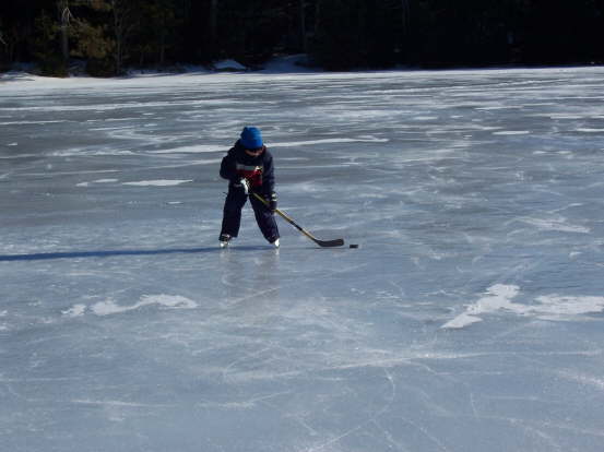 Alex playing hockey