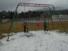 Alex and Luke on the swings