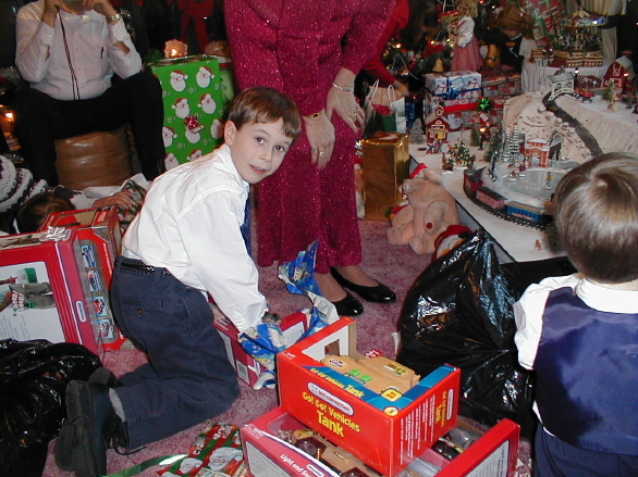 Alex digging into a present