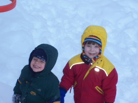 Max and Cameron ready to go sledding